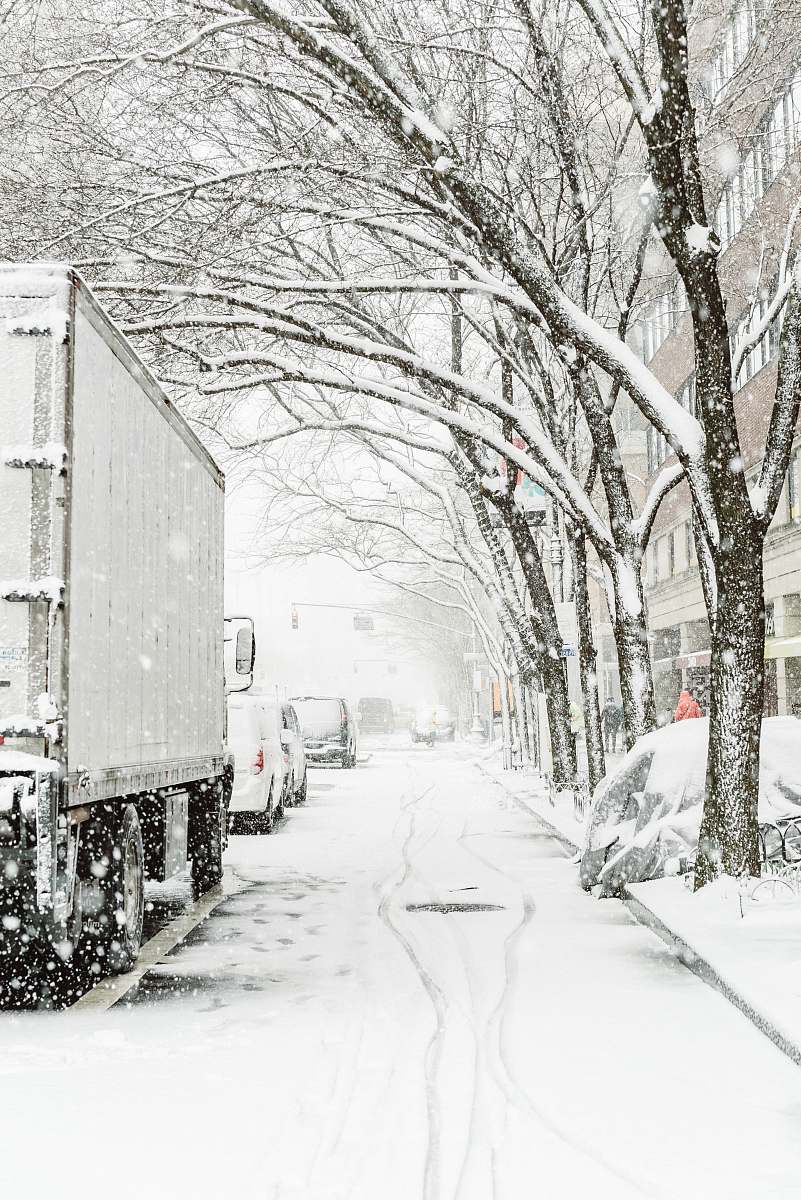 new york gray truck on snowy road road